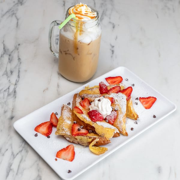 University Diner's French toast with strawberries, whipped cream, and a caramel iced coffee.